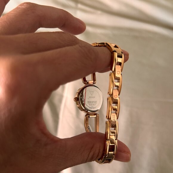 Guess Rose Gold-Tone Cutout Bracelet Analog Watch - Picture 9 of 13